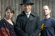 Dirk Gently's Holistic Detective Agency. Image shows from L to R: Janice Pearce (Olivia Colman), Dirk Gently (Harry Enfield), Richard MacDuff (Billy Boyd). Image credit: Above The Title Productions. Dirk Gently's Holistic Detective Agency. Image shows from L to R: Janice Pearce (Olivia Colman), Dirk Gently (Harry Enfield), Richard MacDuff (Billy Boyd). Image credit: Above The Title Productions.