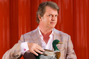 Paul Merton writing a book