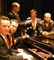 Alex Horne Presents The Horne Section. Image shows from L to R: Keyboards and Piano (Joe Stilgoe), Alex Horne, Bass (Will Collier), Drums and Percussion (Ben Reynolds), Trumpet (Joe Auckland). Image credit: British Broadcasting Corporation. Alex Horne Presents The Horne Section. Image shows from L to R: Keyboards and Piano (Joe Stilgoe), Alex Horne, Bass (Will Collier), Drums and Percussion (Ben Reynolds), Trumpet (Joe Auckland). Image credit: British Broadcasting Corporation.
