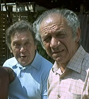 Bless This House. Image shows from L to R: Trevor Lewis (Peter Butterworth), Sid Abbot (Sid James). Image credit: Peter Rogers Productions. Bless This House. Image shows from L to R: Trevor Lewis (Peter Butterworth), Sid Abbot (Sid James). Image credit: Peter Rogers Productions.