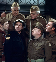 Dad's Army. Image shows from L to R: Private Pike (Ian Lavender), Private Frazer (John Laurie), Chief A.R.P. Warden Hodges (Bill Pertwee), Private Godfrey (Arnold Ridley), Captain Mainwaring (Arthur Lowe), Private Walker (James Beck). Image credit: British Broadcasting Corporation. Dad's Army. Image shows from L to R: Private Pike (Ian Lavender), Private Frazer (John Laurie), Chief A.R.P. Warden Hodges (Bill Pertwee), Private Godfrey (Arnold Ridley), Captain Mainwaring (Arthur Lowe), Private Walker (James Beck). Image credit: British Broadcasting Corporation.