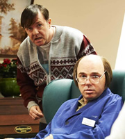 Derek. Image shows from L to R: Derek Noakes (Ricky Gervais), Dougie (Karl Pilkington). Image credit: Derek Productions. Derek. Image shows from L to R: Derek Noakes (Ricky Gervais), Dougie (Karl Pilkington). Image credit: Derek Productions.