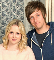 Hebburn. Image shows from L to R: Sarah Pearson (Kimberley Nixon), Jack Pearson (Chris Ramsey). Image credit: Channel X. Hebburn. Image shows from L to R: Sarah Pearson (Kimberley Nixon), Jack Pearson (Chris Ramsey). Image credit: Channel X.