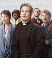 Rev.. Image shows from L to R: Alex Smallbone (Olivia Colman), Adoha Onyeka (Ellen Thomas), Rev Adam Smallbone (Tom Hollander), Nigel McCall (Miles Jupp), Colin Lambert (Steve Evets). Image credit: Big Talk Productions. Rev.. Image shows from L to R: Alex Smallbone (Olivia Colman), Adoha Onyeka (Ellen Thomas), Rev Adam Smallbone (Tom Hollander), Nigel McCall (Miles Jupp), Colin Lambert (Steve Evets). Image credit: Big Talk Productions.
