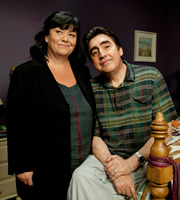 Roger & Val Have Just Got In. Image shows from L to R: Val Stevenson (Dawn French), Roger Stevenson (Alfred Molina). Image credit: British Broadcasting Corporation. Roger & Val Have Just Got In. Image shows from L to R: Val Stevenson (Dawn French), Roger Stevenson (Alfred Molina). Image credit: British Broadcasting Corporation.
