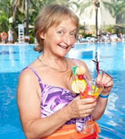 Benidorm. Jacqueline Stewart (Janine Duvitski). Image credit: Tiger Aspect Productions. Benidorm. Jacqueline Stewart (Janine Duvitski). Image credit: Tiger Aspect Productions.