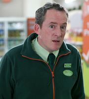 Trollied. Neville (Dominic Coleman). Image credit: Roughcut Television. Trollied. Neville (Dominic Coleman). Image credit: Roughcut Television.