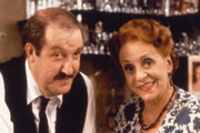 'Allo 'Allo!. Image shows from L to R: René François Artois (Gorden Kaye), Edith Melba Artois (Carmen Silvera). Copyright: BBC. 'Allo 'Allo!. Image shows from L to R: René François Artois (Gorden Kaye), Edith Melba Artois (Carmen Silvera). Copyright: BBC.