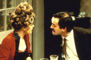 Fawlty Towers. Image shows from L to R: Sybil Fawlty (Prunella Scales), Basil Fawlty (John Cleese). Copyright: BBC. Fawlty Towers. Image shows from L to R: Sybil Fawlty (Prunella Scales), Basil Fawlty (John Cleese). Copyright: BBC.