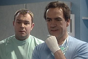 My Family. Image shows from L to R: Roger Bailey Jr. (Keiron Self), Ben Harper (Robert Lindsay). Copyright: DLT Entertainment Ltd. / Rude Boy Productions. My Family. Image shows from L to R: Roger Bailey Jr. (Keiron Self), Ben Harper (Robert Lindsay). Copyright: DLT Entertainment Ltd. / Rude Boy Productions.
