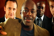 Peep Show. Image shows from L to R: Jeff Heaney (Neil Fitzmaurice), Alan Johnson (Paterson Joseph). Copyright: Objective Productions. Peep Show. Image shows from L to R: Jeff Heaney (Neil Fitzmaurice), Alan Johnson (Paterson Joseph). Copyright: Objective Productions.