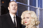 Rock & Chips. Image shows from L to R: Freddie 'The Frog' Robdal (Nicholas Lyndhurst), Joan Trotter (Kellie Bright). Copyright: Shazam Productions / BBC. Rock & Chips. Image shows from L to R: Freddie 'The Frog' Robdal (Nicholas Lyndhurst), Joan Trotter (Kellie Bright). Copyright: Shazam Productions / BBC.