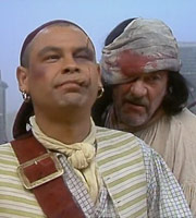 Captain Butler. Image shows from L to R: Captain Butler (Craig Charles), Bosun (Shaun Curry). Copyright: Essential Film And Television Productions. Captain Butler. Image shows from L to R: Captain Butler (Craig Charles), Bosun (Shaun Curry). Copyright: Essential Film And Television Productions.