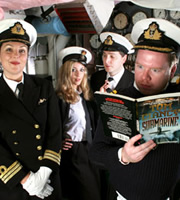 Deep Trouble. Image shows from L to R: Commander Alison Fairbanks (Katherine Jakeways), Petty Officer Lucy Radcliffe (Miranda Raison), Lieutenant Jack Trainor (Ben Willbond), Captain Paul Wade (Jim Field Smith). Copyright: Pozzitive Productions / BBC. Deep Trouble. Image shows from L to R: Commander Alison Fairbanks (Katherine Jakeways), Petty Officer Lucy Radcliffe (Miranda Raison), Lieutenant Jack Trainor (Ben Willbond), Captain Paul Wade (Jim Field Smith). Copyright: Pozzitive Productions / BBC.