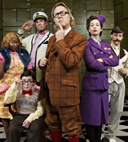 The Ministry Of Curious Stuff. Image shows from L to R: Miss Wannamaker (Rhyanna Alexander-Davis), Mr Frazernagle (Jack Carroll), Captain Length-Width (Dan Skinner), Mr Reeves (Vic Reeves), Miss Teaparty (Beth Rylance), Mr Lovett (Tyger Drew-Honey). Copyright: BBC. The Ministry Of Curious Stuff. Image shows from L to R: Miss Wannamaker (Rhyanna Alexander-Davis), Mr Frazernagle (Jack Carroll), Captain Length-Width (Dan Skinner), Mr Reeves (Vic Reeves), Miss Teaparty (Beth Rylance), Mr Lovett (Tyger Drew-Honey). Copyright: BBC.