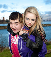 Two Pints Of Lager And A Packet Of Crisps. Image shows from L to R: Tim (Luke Gell), Cassie (Georgia Henshaw). Copyright: BBC. Two Pints Of Lager And A Packet Of Crisps. Image shows from L to R: Tim (Luke Gell), Cassie (Georgia Henshaw). Copyright: BBC.