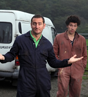 White Van Man. Image shows from L to R: Ollie (Will Mellor), Darren (Joel Fry). Copyright: ITV Studios. White Van Man. Image shows from L to R: Ollie (Will Mellor), Darren (Joel Fry). Copyright: ITV Studios.