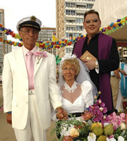 Benidorm. Image shows from L to R: Mel (Geoffrey Hutchings), Madge (Sheila Reid), Vicar (Gary Brown). Copyright: Tiger Aspect Productions. Benidorm. Image shows from L to R: Mel (Geoffrey Hutchings), Madge (Sheila Reid), Vicar (Gary Brown). Copyright: Tiger Aspect Productions.