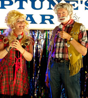Benidorm. Image shows from L to R: Jacqueline Stewart (Janine Duvitski), Glynn Flint (Alan David). Copyright: Tiger Aspect Productions. Benidorm. Image shows from L to R: Jacqueline Stewart (Janine Duvitski), Glynn Flint (Alan David). Copyright: Tiger Aspect Productions.