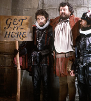 Blackadder. Image shows from L to R: Lord Edmund Blackadder (Rowan Atkinson), Arthur the Sailor (John Pierce Jones), Baldrick (Tony Robinson). Copyright: BBC / Tiger Aspect Productions. Blackadder. Image shows from L to R: Lord Edmund Blackadder (Rowan Atkinson), Arthur the Sailor (John Pierce Jones), Baldrick (Tony Robinson). Copyright: BBC / Tiger Aspect Productions.