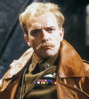 Blackadder. Squadron Leader Lord Flasheart (Rik Mayall). Copyright: BBC / Tiger Aspect Productions. Blackadder. Squadron Leader Lord Flasheart (Rik Mayall). Copyright: BBC / Tiger Aspect Productions.