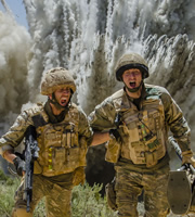 Bluestone 42. Image shows from L to R: Towerblock (Matthew Lewis), Nick (Oliver Chris). Copyright: BBC. Bluestone 42. Image shows from L to R: Towerblock (Matthew Lewis), Nick (Oliver Chris). Copyright: BBC.