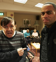 Derek. Image shows from L to R: Derek (Ricky Gervais), Deon (Ben Bailey Smith). Copyright: Derek Productions. Derek. Image shows from L to R: Derek (Ricky Gervais), Deon (Ben Bailey Smith). Copyright: Derek Productions.
