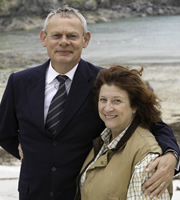 Doc Martin. Image shows from L to R: Dr Martin Ellingham (Martin Clunes), Angela Sim (Caroline Quentin). Copyright: Buffalo Pictures / Homerun Productions. Doc Martin. Image shows from L to R: Dr Martin Ellingham (Martin Clunes), Angela Sim (Caroline Quentin). Copyright: Buffalo Pictures / Homerun Productions.