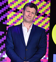 Edinburgh Comedy Fest Live. Adam Hills. Copyright: Open Mike Productions. Edinburgh Comedy Fest Live. Adam Hills. Copyright: Open Mike Productions.