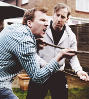 Father Figure. Image shows from L to R: Tom Whyte (Jason Byrne), Roddy (Michael Smiley). Copyright: BBC / Idil Sukan. Father Figure. Image shows from L to R: Tom Whyte (Jason Byrne), Roddy (Michael Smiley). Copyright: BBC / Idil Sukan.