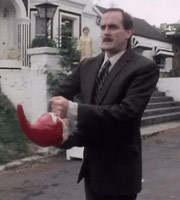 Fawlty Towers. Basil Fawlty (John Cleese). Copyright: BBC. Fawlty Towers. Basil Fawlty (John Cleese). Copyright: BBC.