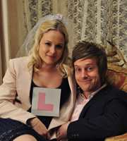 Hebburn. Image shows from L to R: Sarah Pearson (Kimberley Nixon), Jack Pearson (Chris Ramsey). Copyright: Channel X North / Baby Cow Productions. Hebburn. Image shows from L to R: Sarah Pearson (Kimberley Nixon), Jack Pearson (Chris Ramsey). Copyright: Channel X North / Baby Cow Productions.