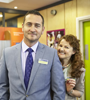 The Job Lot. Image shows from L to R: Greg (Will Mellor), Trish (Sarah Hadland). Copyright: Big Talk Productions. The Job Lot. Image shows from L to R: Greg (Will Mellor), Trish (Sarah Hadland). Copyright: Big Talk Productions.