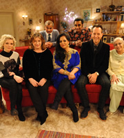 The Kumars. Image shows from L to R: Emilia Fox, Caroline Quentin, Ashwin (Vincent Ebrahim), Hawney (Harvey Virdi), Sanjeev (Sanjeev Bhaskar), Richard E. Grant, Ummi (Meera Syal). Copyright: Hat Trick Productions / Avatar. The Kumars. Image shows from L to R: Emilia Fox, Caroline Quentin, Ashwin (Vincent Ebrahim), Hawney (Harvey Virdi), Sanjeev (Sanjeev Bhaskar), Richard E. Grant, Ummi (Meera Syal). Copyright: Hat Trick Productions / Avatar.
