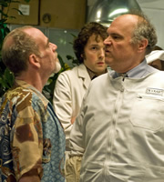 Lab Rats. Image shows from L to R: Professor John Mycroft (Geoffrey McGivern), Dr Alex Beenyman (Chris Addison), Dr Vaabit (Mike McShane). Copyright: BBC. Lab Rats. Image shows from L to R: Professor John Mycroft (Geoffrey McGivern), Dr Alex Beenyman (Chris Addison), Dr Vaabit (Mike McShane). Copyright: BBC.