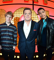 Live At The Apollo. Image shows from L to R: Josh Widdicombe, Eddie Izzard, Trevor Noah. Copyright: Open Mike Productions. Live At The Apollo. Image shows from L to R: Josh Widdicombe, Eddie Izzard, Trevor Noah. Copyright: Open Mike Productions.
