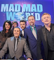 Mad Mad World. Image shows from L to R: Janice Dickinson, Rhys Darby, Paddy McGuinness, Rob Rouse, Rufus Hound, Louis Walsh. Copyright: Roughcut Television. Mad Mad World. Image shows from L to R: Janice Dickinson, Rhys Darby, Paddy McGuinness, Rob Rouse, Rufus Hound, Louis Walsh. Copyright: Roughcut Television.