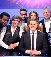Mad Mad World. Image shows from L to R: Stephen K Amos, Rhys Darby, Rob Rouse, Stacey Solomon, Paddy McGuinness, Eamonn Holmes. Copyright: Roughcut Television. Mad Mad World. Image shows from L to R: Stephen K Amos, Rhys Darby, Rob Rouse, Stacey Solomon, Paddy McGuinness, Eamonn Holmes. Copyright: Roughcut Television.
