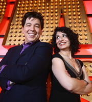 Michael McIntyre's Comedy Roadshow. Image shows from L to R: Michael McIntyre, Shappi Khorsandi. Copyright: Open Mike Productions. Michael McIntyre's Comedy Roadshow. Image shows from L to R: Michael McIntyre, Shappi Khorsandi. Copyright: Open Mike Productions.