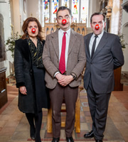 Mr. Bean. Image shows from L to R: Widow (Rebecca Front), Mr. Bean (Rowan Atkinson), Mourner (Ben Miller). Copyright: Tiger Aspect Productions. Mr. Bean. Image shows from L to R: Widow (Rebecca Front), Mr. Bean (Rowan Atkinson), Mourner (Ben Miller). Copyright: Tiger Aspect Productions.