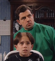 Mr. Bean. Image shows from L to R: Jamie (Jamie Yeates), Mr. Bean (Rowan Atkinson). Copyright: Tiger Aspect Productions. Mr. Bean. Image shows from L to R: Jamie (Jamie Yeates), Mr. Bean (Rowan Atkinson). Copyright: Tiger Aspect Productions.