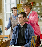 Mrs. Brown's Boys. Image shows from L to R: Winnie McGoogan (Eilish O'Carroll), Trevor Brown (Martin Delany), Agnes Brown (Brendan O'Carroll). Copyright: BBC / BocPix. Mrs. Brown's Boys. Image shows from L to R: Winnie McGoogan (Eilish O'Carroll), Trevor Brown (Martin Delany), Agnes Brown (Brendan O'Carroll). Copyright: BBC / BocPix.