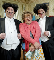 Mrs. Brown's Boys. Image shows from L to R: Dermot Brown (Paddy Houlihan), Agnes Brown (Brendan O'Carroll), Buster Brady (Danny O'Carroll). Copyright: BBC / BocPix. Mrs. Brown's Boys. Image shows from L to R: Dermot Brown (Paddy Houlihan), Agnes Brown (Brendan O'Carroll), Buster Brady (Danny O'Carroll). Copyright: BBC / BocPix.