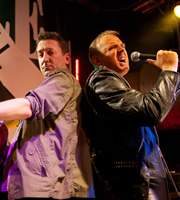 Not Going Out. Image shows from L to R: Lee (Lee Mack), Tim (Tim Vine). Copyright: Avalon Television / Arlo Productions. Not Going Out. Image shows from L to R: Lee (Lee Mack), Tim (Tim Vine). Copyright: Avalon Television / Arlo Productions.