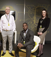 PhoneShop. Image shows from L to R: Lance (Martin Trenaman), Jerwayne (Javone Prince), Janine (Emma Fryer). Copyright: Talkback. PhoneShop. Image shows from L to R: Lance (Martin Trenaman), Jerwayne (Javone Prince), Janine (Emma Fryer). Copyright: Talkback.
