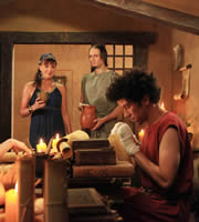 Plebs. Image shows from L to R: Flavia (Doon Mackichan), Aurelius (Tom Basden), Stylax (Joel Fry). Copyright: RISE Films. Plebs. Image shows from L to R: Flavia (Doon Mackichan), Aurelius (Tom Basden), Stylax (Joel Fry). Copyright: RISE Films.