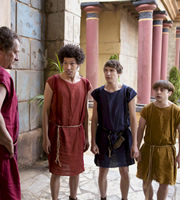 Plebs. Image shows from L to R: Cornelius (Neil Stuke), Stylax (Joel Fry), Marcus (Tom Rosenthal), Grumio (Ryan Sampson). Copyright: RISE Films. Plebs. Image shows from L to R: Cornelius (Neil Stuke), Stylax (Joel Fry), Marcus (Tom Rosenthal), Grumio (Ryan Sampson). Copyright: RISE Films.