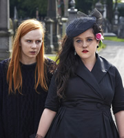 Raised By Wolves. Image shows from L to R: Aretha Garry (Alexa Davies), Germaine Garry (Helen Monks). Copyright: Big Talk Productions. Raised By Wolves. Image shows from L to R: Aretha Garry (Alexa Davies), Germaine Garry (Helen Monks). Copyright: Big Talk Productions.
