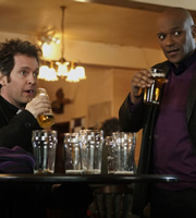 Rev.. Image shows from L to R: Rev Adam Smallbone (Tom Hollander), Leon (Colin Salmon). Copyright: Big Talk Productions. Rev.. Image shows from L to R: Rev Adam Smallbone (Tom Hollander), Leon (Colin Salmon). Copyright: Big Talk Productions.