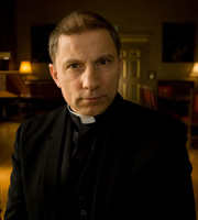 Rev.. Archdeacon Robert (Simon McBurney). Copyright: Big Talk Productions. Rev.. Archdeacon Robert (Simon McBurney). Copyright: Big Talk Productions.